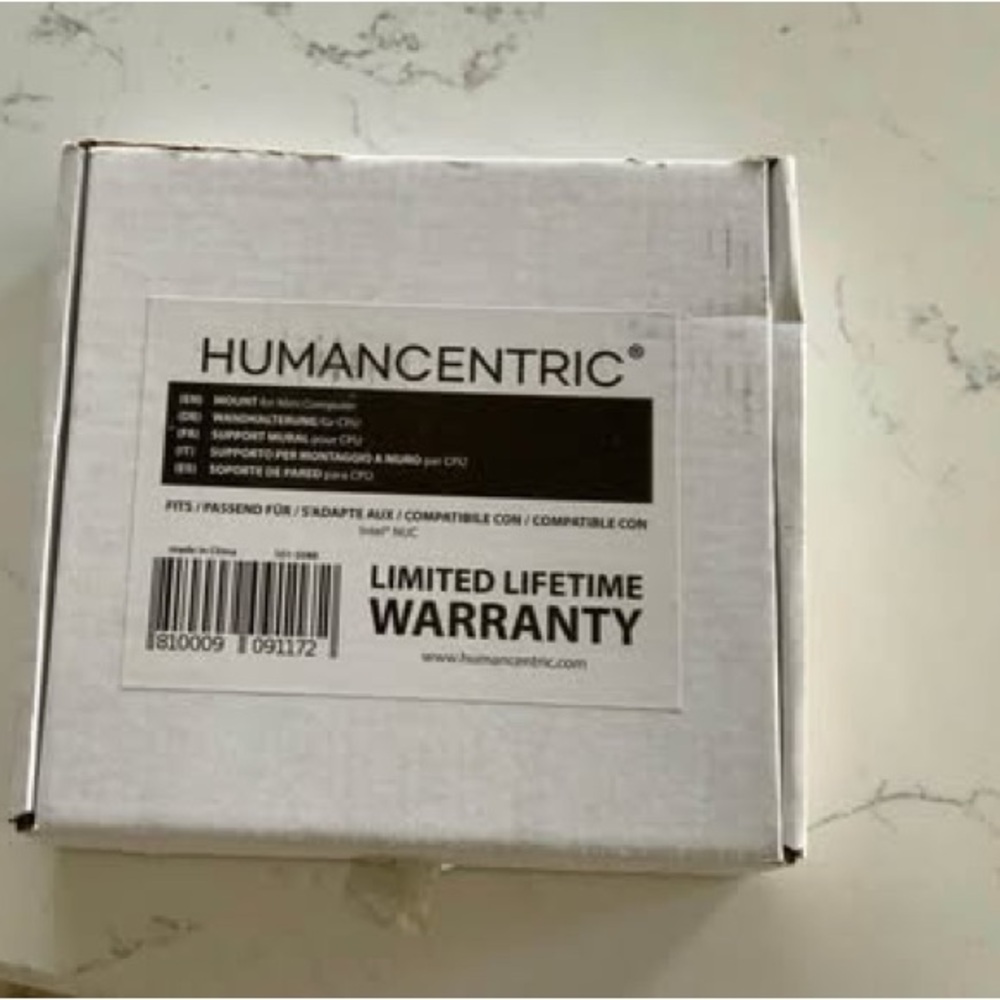 Human centric mount for mini computers.